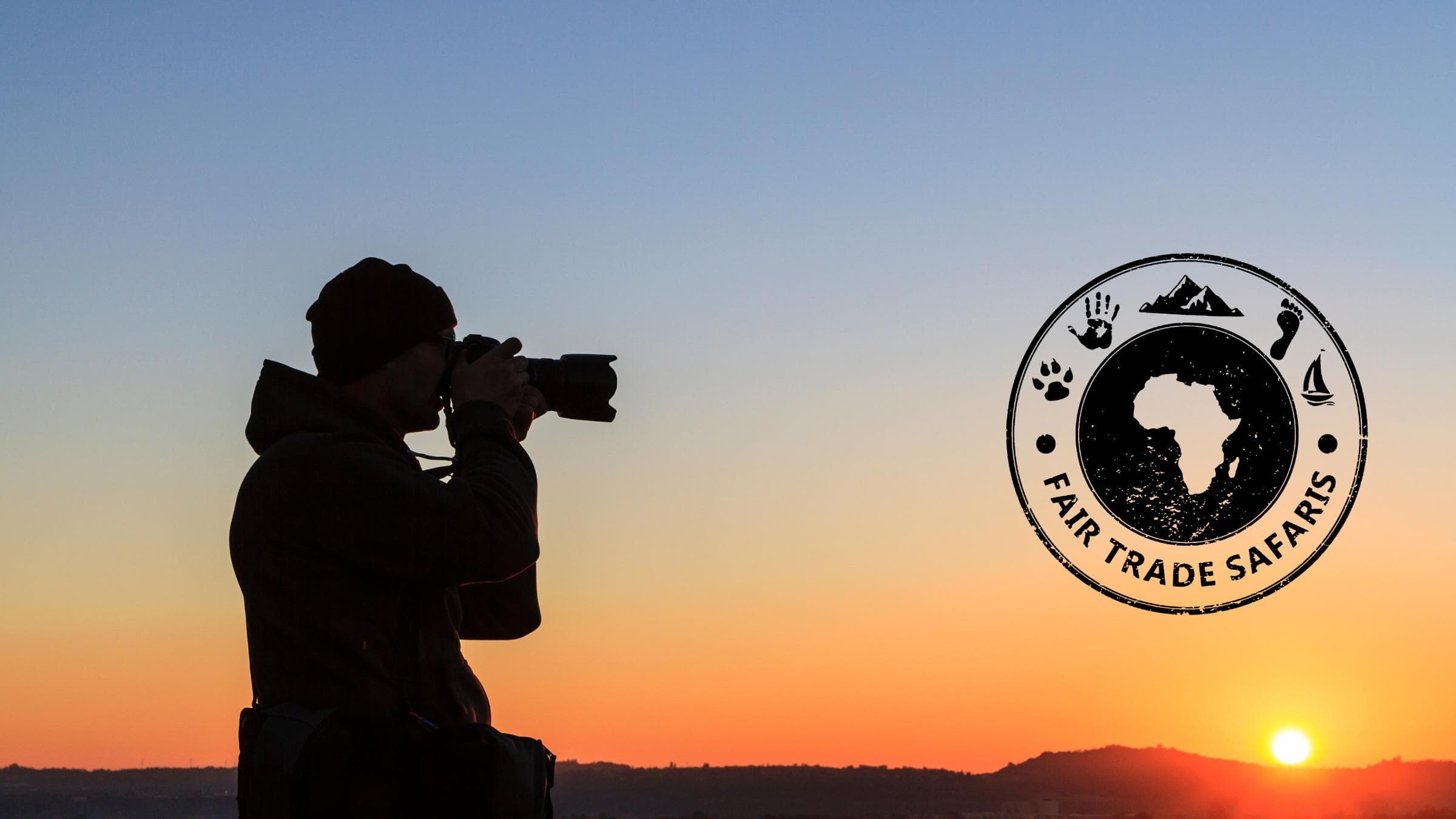 Wildlife photographer silhouetted at sunset on safari in Africa, representing ethical travel with Fair Trade Safaris