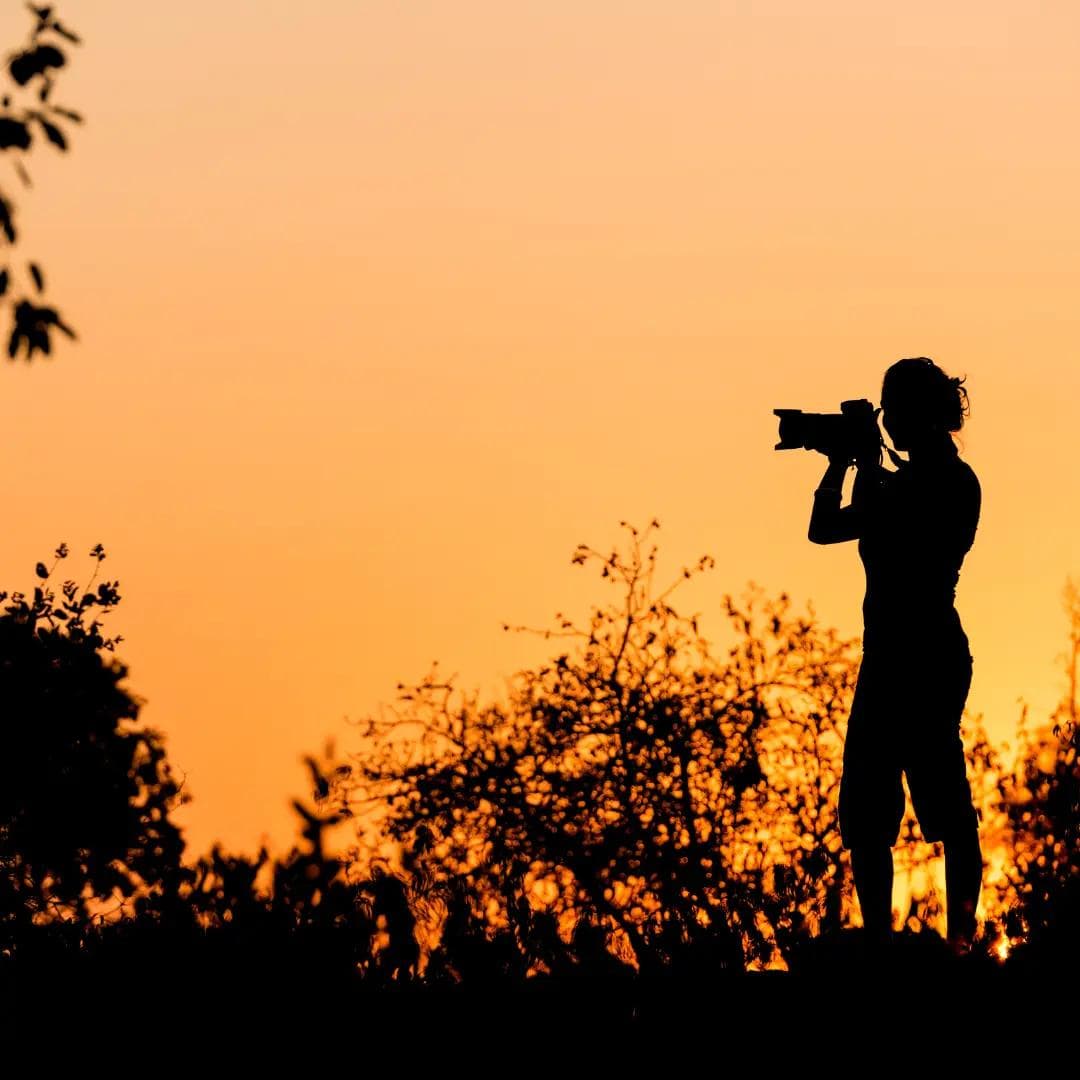 silhouette or photographer at dusk